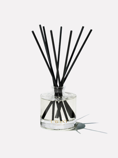 Holiday scented oil and reeds in glass jar